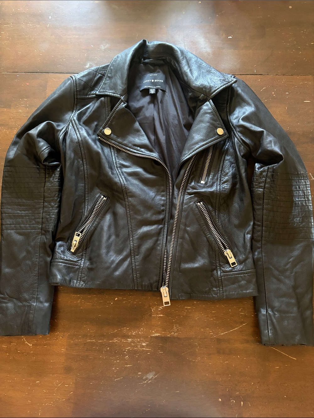 Blank NYC Black Faux Leather Moto Jacket with Quilted Sleeve Detail
